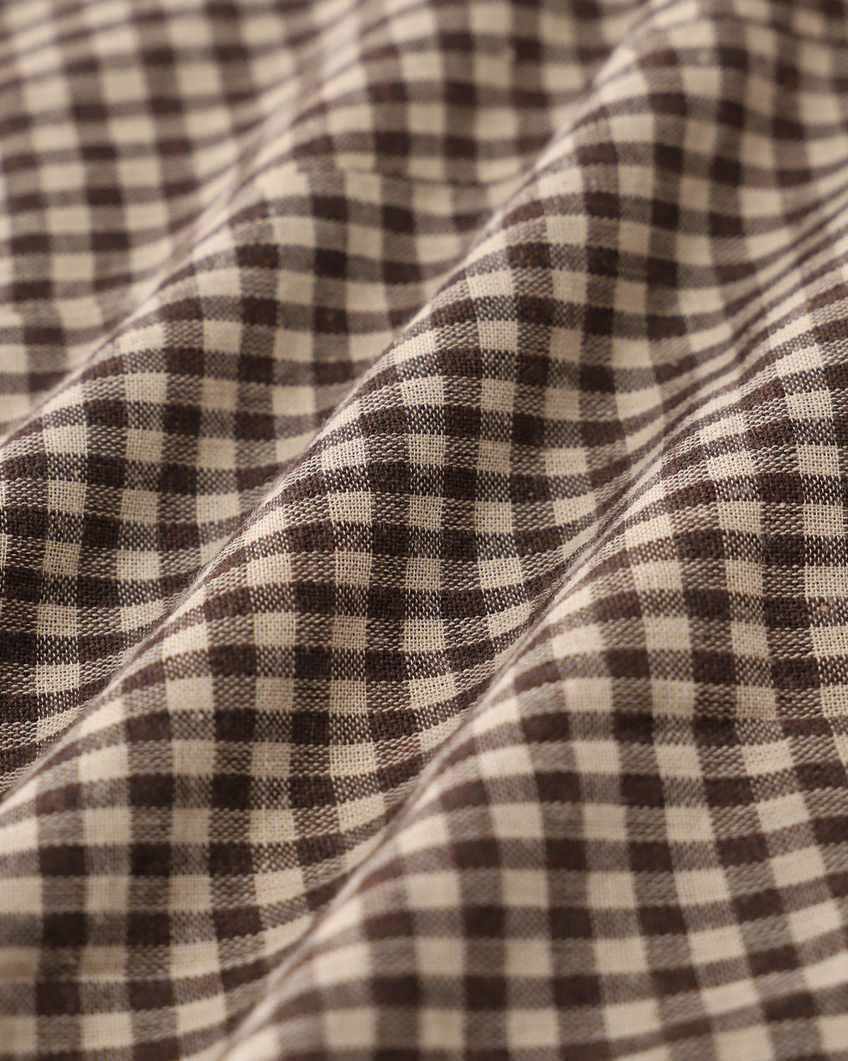 Brązowa kratkowa kamizelka jednorzędowa